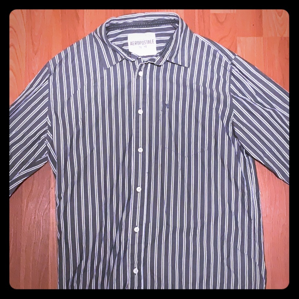 Long sleeve button up shirt.